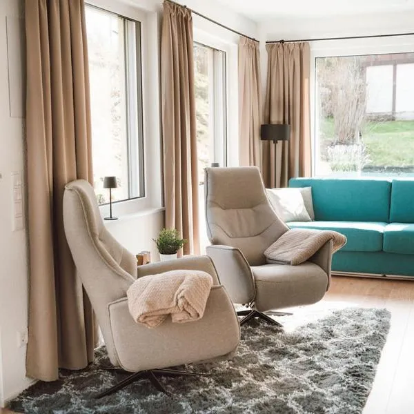 Gemütliches Ferienhaus "Glück" mit Gartensauna - Ideal für Familien & Paare，位于齐根吕克的酒店