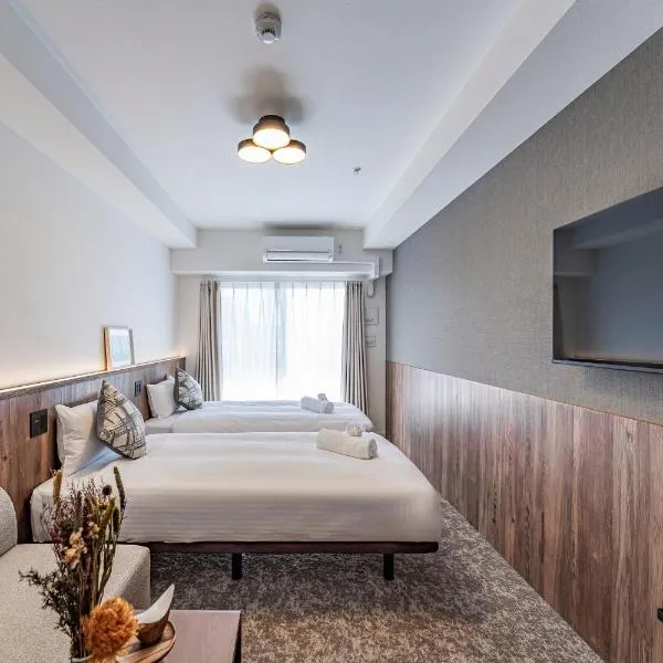 Apartment Hotel 11 Osaka Dome，位于大阪的酒店