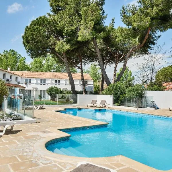 Artemia Aigues-Mortes - Hotel avec piscine，位于艾格-莫尔特的酒店