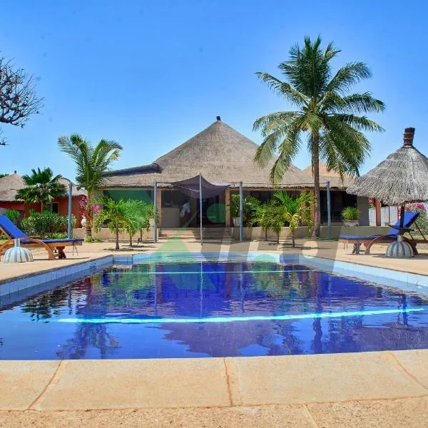 VILLA à la Résidence Nianing1 avec Piscine et Jardin 1100m2，位于姆布尔的酒店