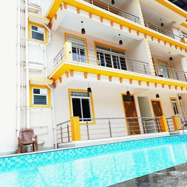Lykke Suites- 2-min Drive to Colva Beach-By Goan Felicidade Hospitality PVT LTD，位于科尔瓦的酒店