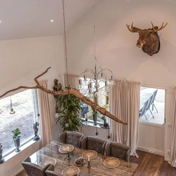 Charming house in nature reserve，位于Målaskog的酒店