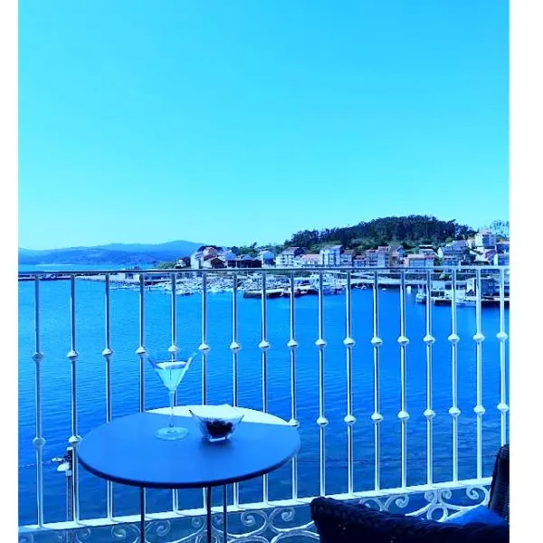 Hotel Puerto Arnela，位于卡马里尼亚斯的酒店