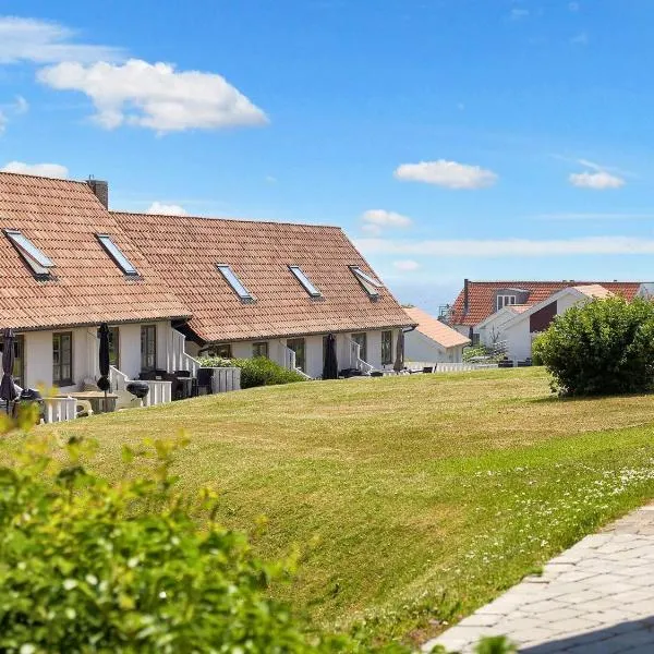 Holiday home Gudhjem XIV，位于古兹耶姆的酒店