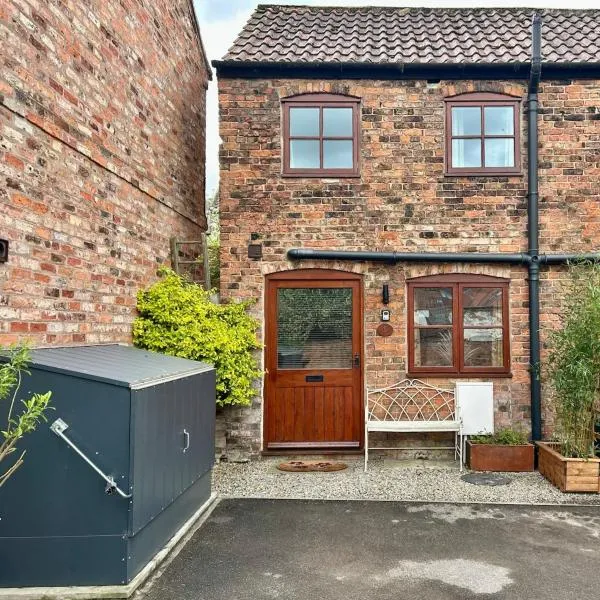 1 Bed cottage town centre free private parking cycle store Boroughbridge，位于巴勒布里奇的酒店