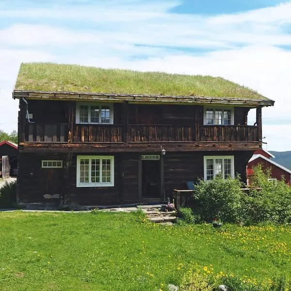 Koselig tømmerhus på gammel gård i Skåbu，位于Graupe的酒店