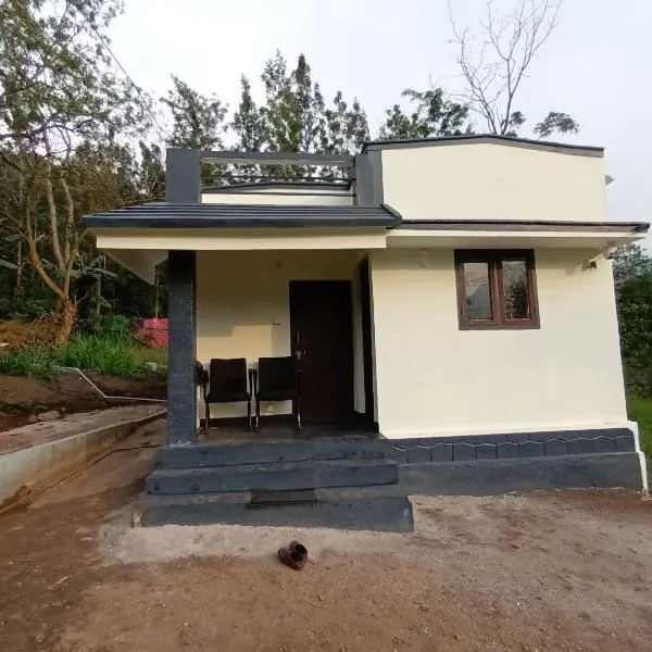 Pambaar river view Homestay，位于Kanthalloor的酒店