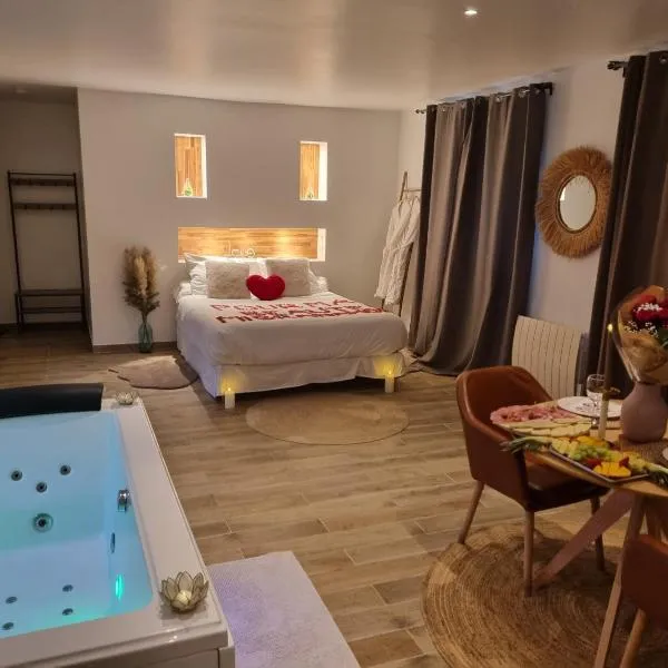 Suite de charme avec JACUZZI illimité et jardin privatif，位于圣普里的酒店