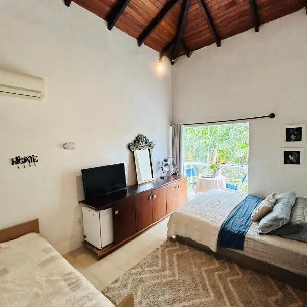 Quarto em casa de praia com estacionamento，位于巴拉奈里奥-坎布里乌的酒店