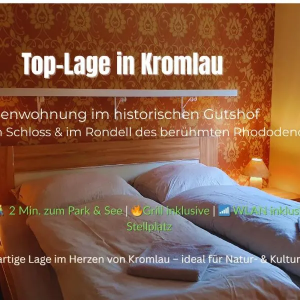 Ferienwohnung im Gutshof Direkt gegenüber dem Schloss, Rhododendronpark mit Terrasse und WLAN，位于Kromlau的酒店