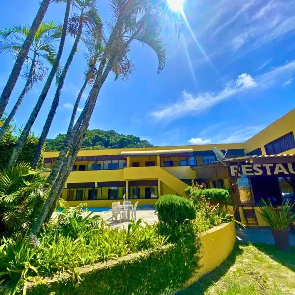 Pousada H Guarujá，位于瓜鲁雅的酒店