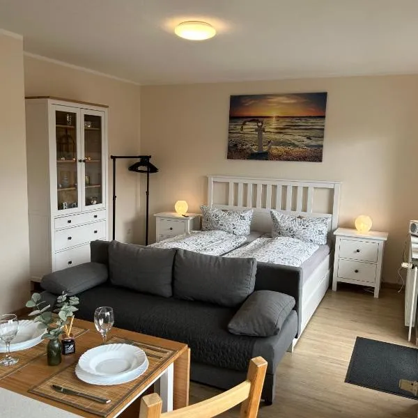 Ferienwohnung Ritthoff Perlebucht - mit Strandkorb am Meer und kostenloser Eintritt ins Schwimmbad，位于比苏姆的酒店