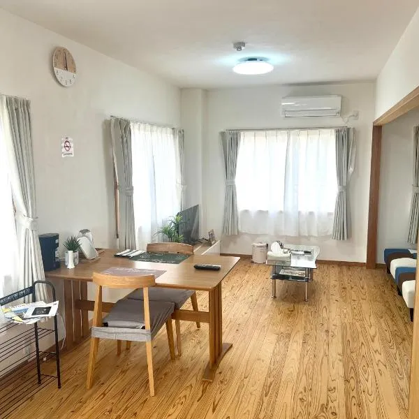 オレンジコーポ 202号室，位于荒尾的酒店