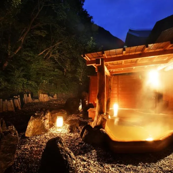 Hotel Kunitomi Suisennkaku，位于系鱼川市的酒店