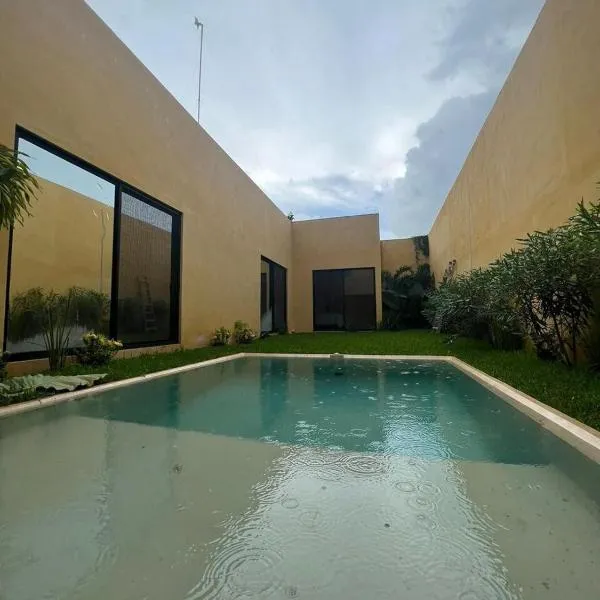 casa de una planta con alberca，位于梅里达的酒店