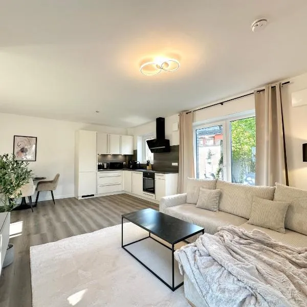 Harmony Homes - Nähe Bahnhof - Terasse - Smart-TV - Nähe Hamburg & Flughafen，位于亨施泰特-乌尔茨堡的酒店