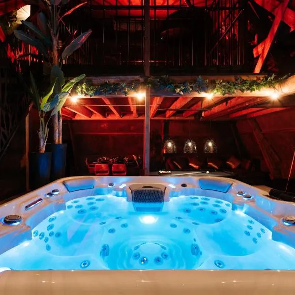 Intense Experience - Suites wellness avec piscine jacuzzi sauna billard privatifs，位于Manage的酒店