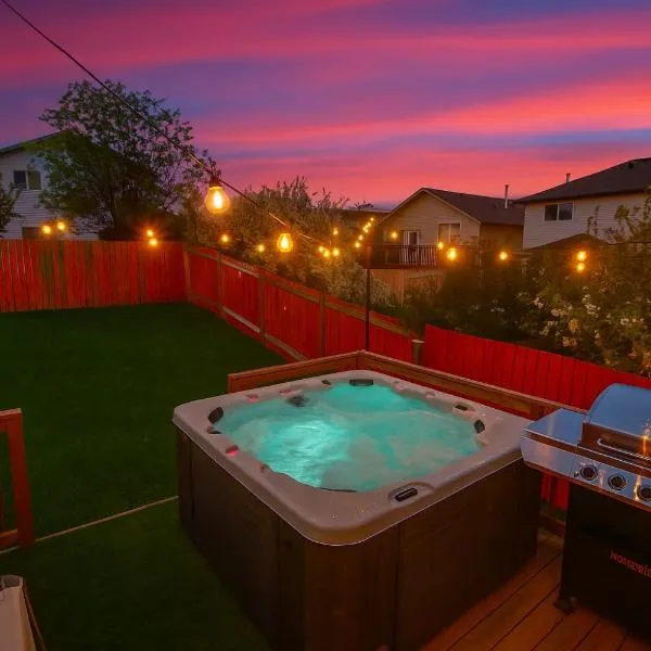 Spa Oasis Home - Hot Tub - King Bed - AC - BBQ - Garage!，位于埃德蒙顿的酒店