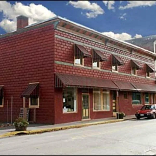 麦恩套房酒店，位于Andes的酒店