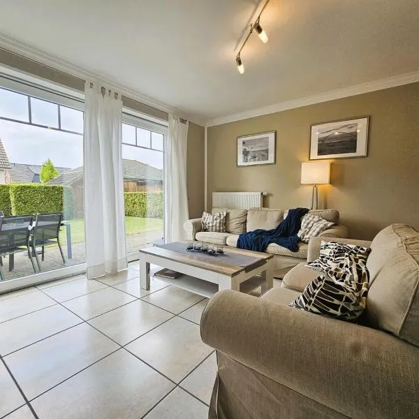 Gemütliche Ferienwohnung mit Garten in Strandnähe，位于费马恩的酒店