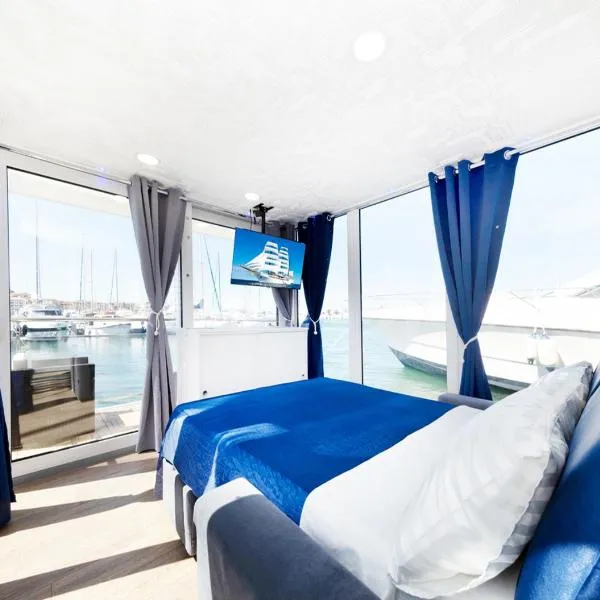 Alghero houseboat Blue Zone，位于阿尔盖罗的酒店