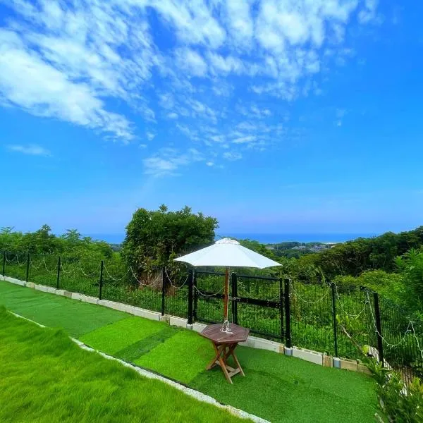 Pet-friendly, entire house rental on Shikashima! 100-tsubo dog run and ocean view，位于Kashima的酒店