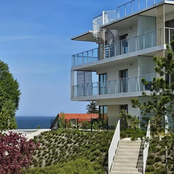 Mechelinki, Apartament z ogródkiem, widokiem na morze i aneksem kuchennym，位于梅彻林基的酒店