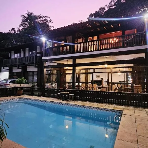 Pousada Demuner House，位于伊泰帕瓦的酒店