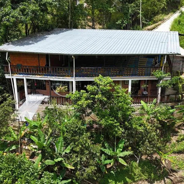 La Casa De Los Sueños Colombia Hostel Campestre de Bienestar meditación naturaleza，位于伊瓦格的酒店