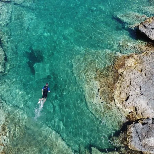 伊索莱特雷米蒂意大利旅游俱乐部露营地，位于圣多米诺的酒店