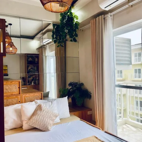 Cozy Layover Pad, 633B Amani, 4 Mins Airport , Poolview & Netflix，位于Pusok的酒店