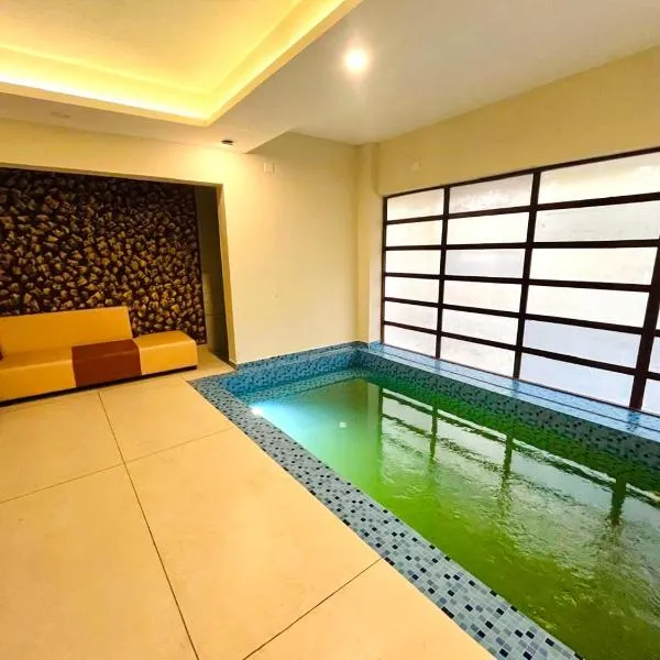 Whitehouse homestay，位于坎努尔的酒店