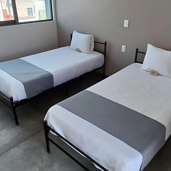 SUITE DALIA, AA, cocineta, baño privado, ubicación，位于特皮克的酒店