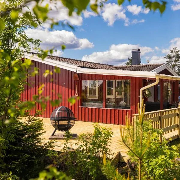 Långrösta; Ruime blokhut grenzend aan bos，位于哈格福什的酒店