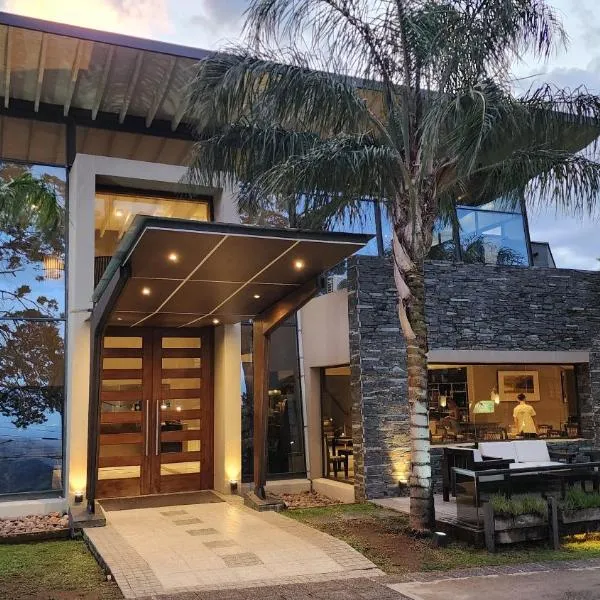 Altos De Merlo Suites，位于梅洛的酒店