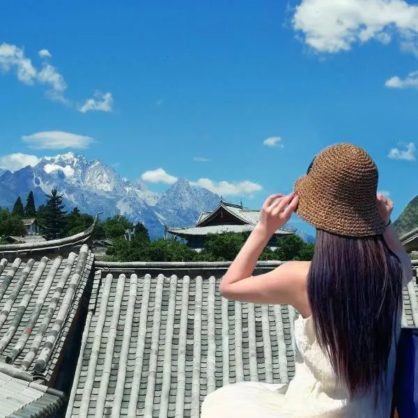 Yiyuan Snow Mountain View Naxi Style Inn- Lijiang Old Town Mufu branch，位于丽江的酒店
