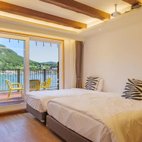 统营韩山滨海度假村 ，位于统营市的酒店