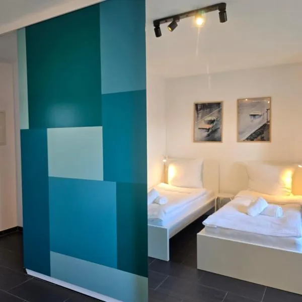 APARTMENT PD23 ALTE FEUERWACHE I Ganze Wohnung I 5 Einzelbetten I 3 Zimmer I 3min CityHospital I 50m Supermarkt I Küche I SmartTV，位于伊本比伦的酒店