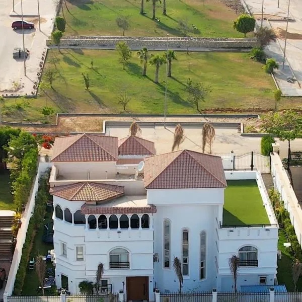Malek Hotel，位于Sheikh Zayed的酒店