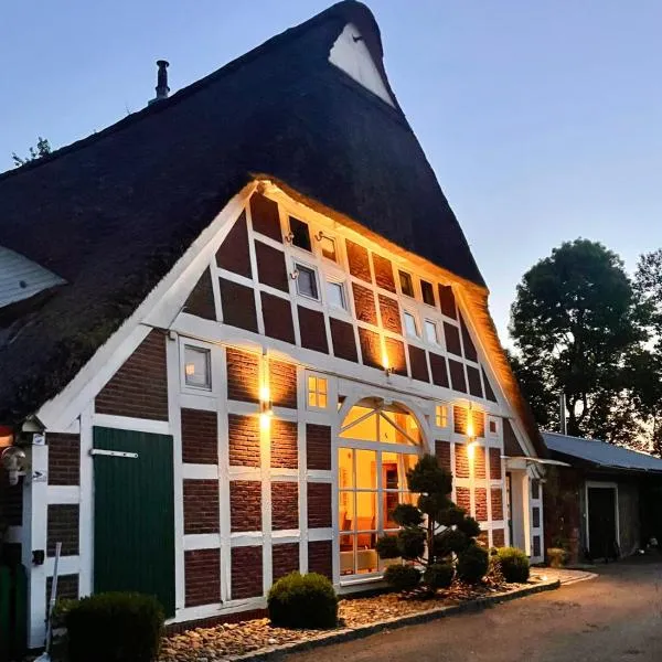 Altes Landhaus Oste, Appartement- Hotel mit Kamin，位于Hemmoor的酒店