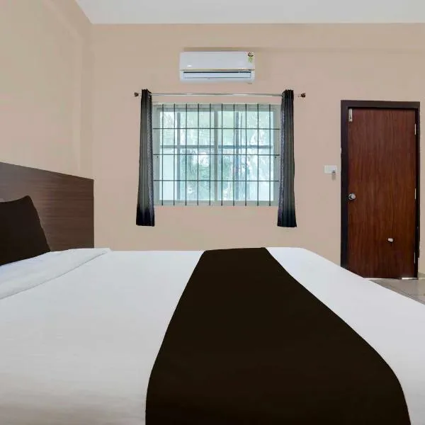 Super Hotel O Chikmagalur Near Zilla Panchayat，位于奇克马格尔的酒店