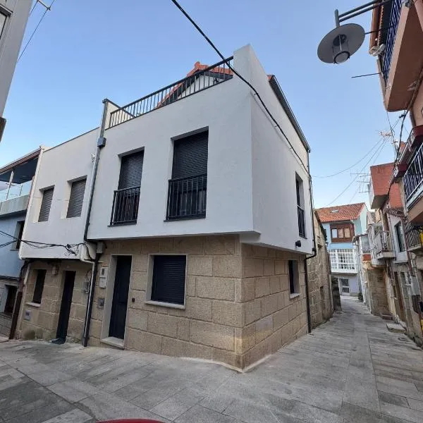 Casa Faixa by RENTING HOME GALICIA，位于坎加斯德穆拉索的酒店