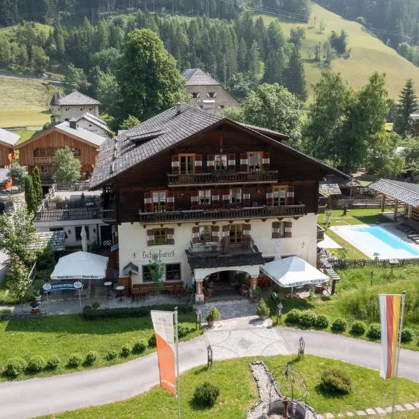 Schlosswirt Chalets & Apartments，位于大基希海姆的酒店