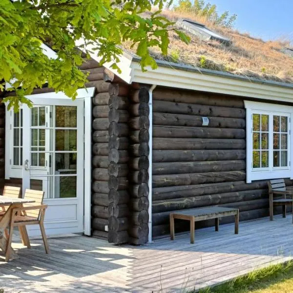Nordic Idyll In The Log House At Dronningmølle，位于德隆宁莫勒的酒店
