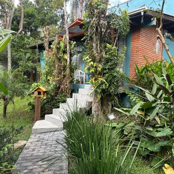 RECANTO DOS PASSARINHOS LINDA CASA COM 2 quartos，位于巴拉奈里奥-坎布里乌的酒店