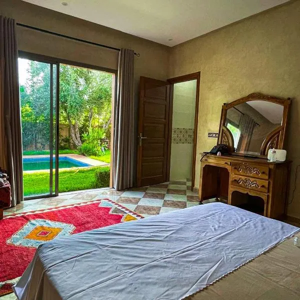 Villa à ourika, piscine et montagnes, 40 min Marrakech，位于乌鲁卡的酒店