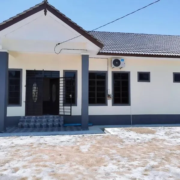 Rhuteng Homestay - Pantai Penarik，位于士兆的酒店