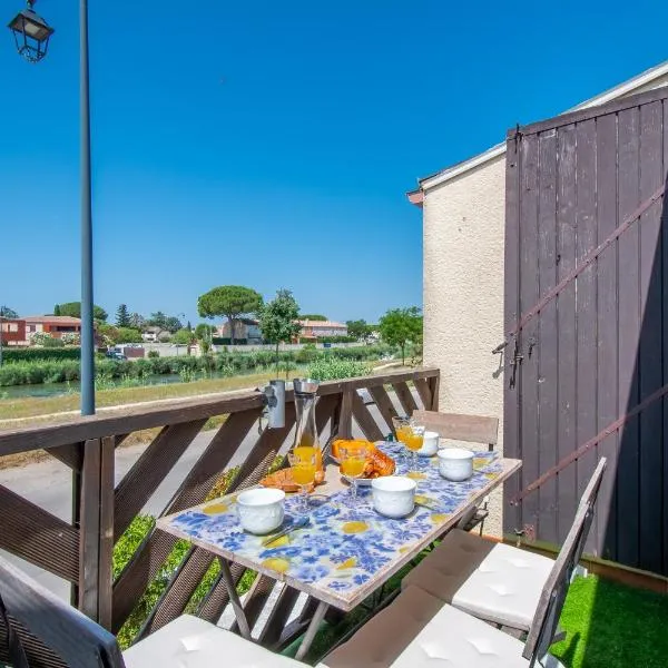 Le Camarguais Vue Canal A 2 pas des remparts d'Aigues-Mortes，位于艾格-莫尔特的酒店
