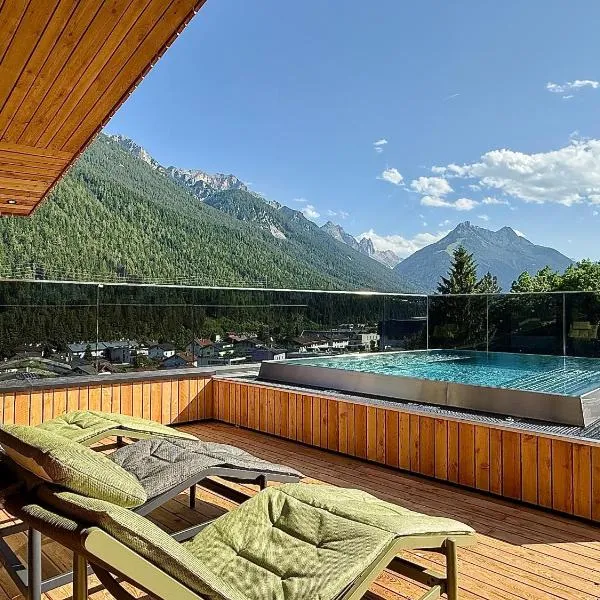 Lärchenlodge SkySpa and Rooftop Pool inklusive Stubai SuperCard，位于富尔普梅斯的酒店