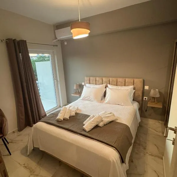 Blue Calm - Kalamos Seaside Studios，位于Áyioi Apóstoloi的酒店